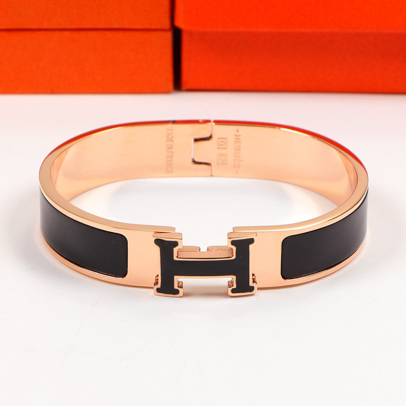 18K Clic Hermes Black Bracelet