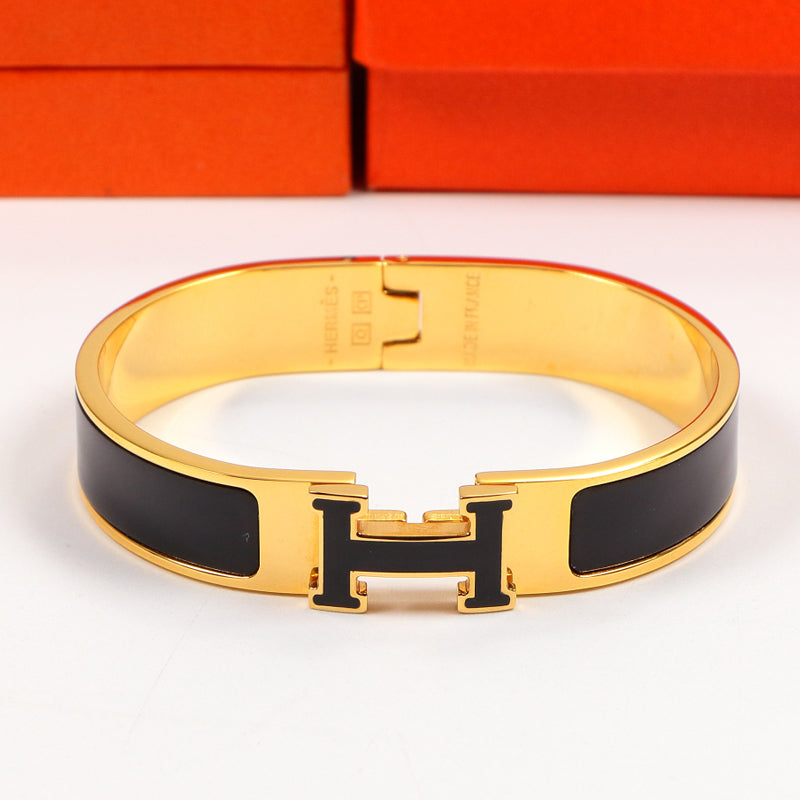 18K Clic Hermes Black Bracelet