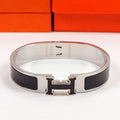 18K Clic Hermes Black Bracelet