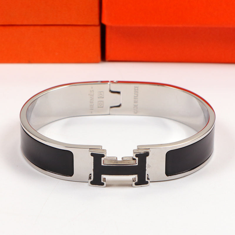 18K Clic Hermes Black Bracelet