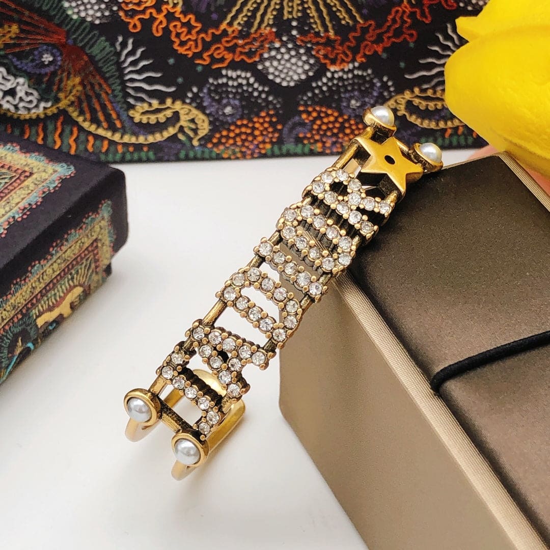 18K Dior Tone Logo Star Bangle Bracelet
