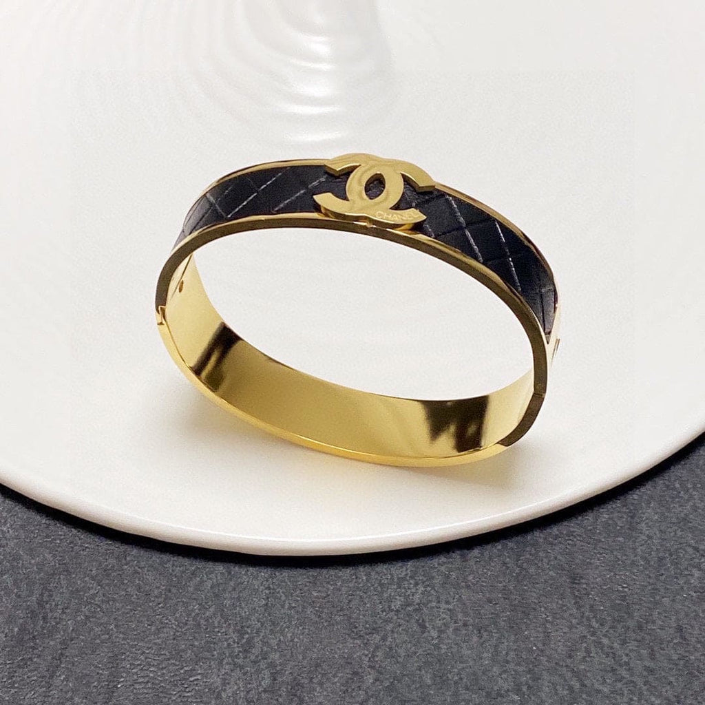 18K Chanel Cuff & Leather Bracelet