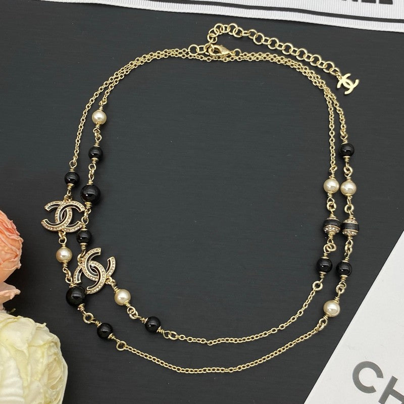 18K Chanel Black Pearl Long Necklace