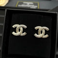 18K Chanel Relief Gold Earrings