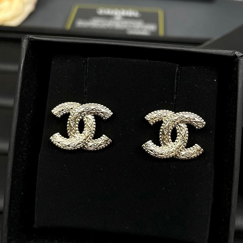 18K Chanel Relief Gold Earrings