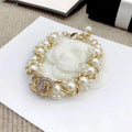 18K Chanel Pearl Braided Bracelet