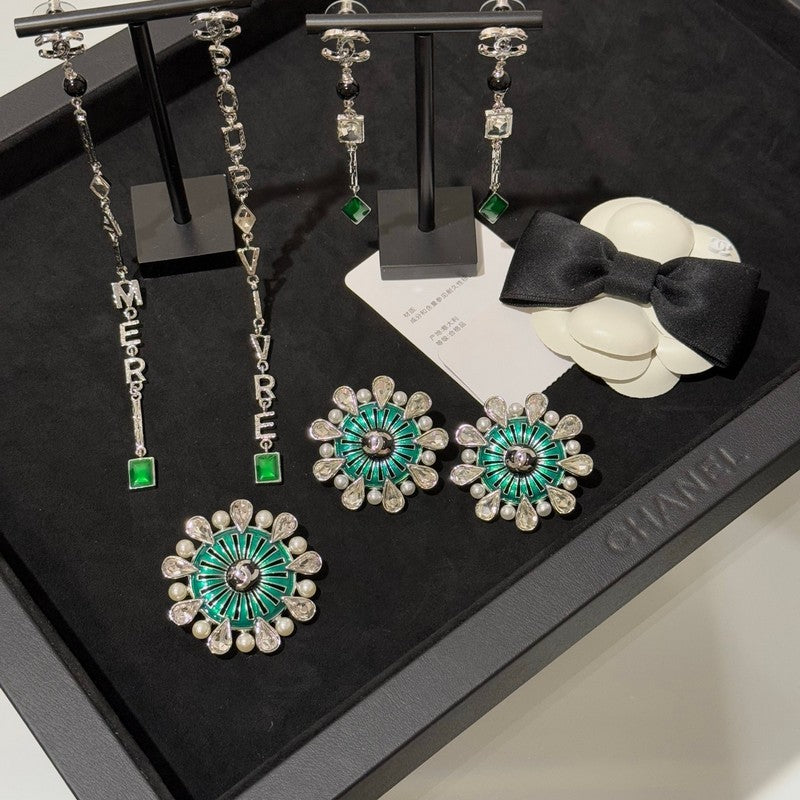 18K Chanel 26C Crystal Green Earrings