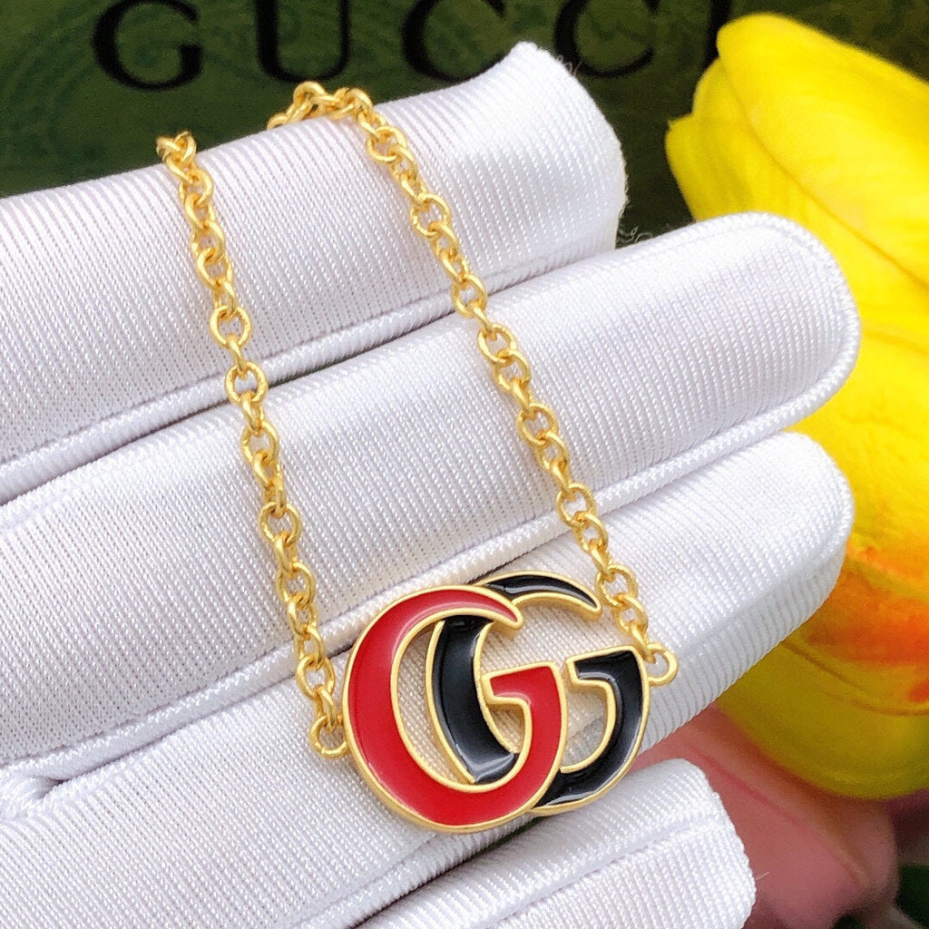 18K Gucci Pink & Black Logo Bracelet
