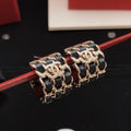 18K Chanel Leather Gold Circle Earrings