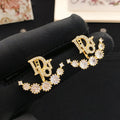 18K Dior Seven Diamond Star Earrings