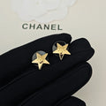 18K Chanel Star Gold Earrings