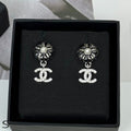 18K Chanel 26C Diamond Black Camellia Earrings