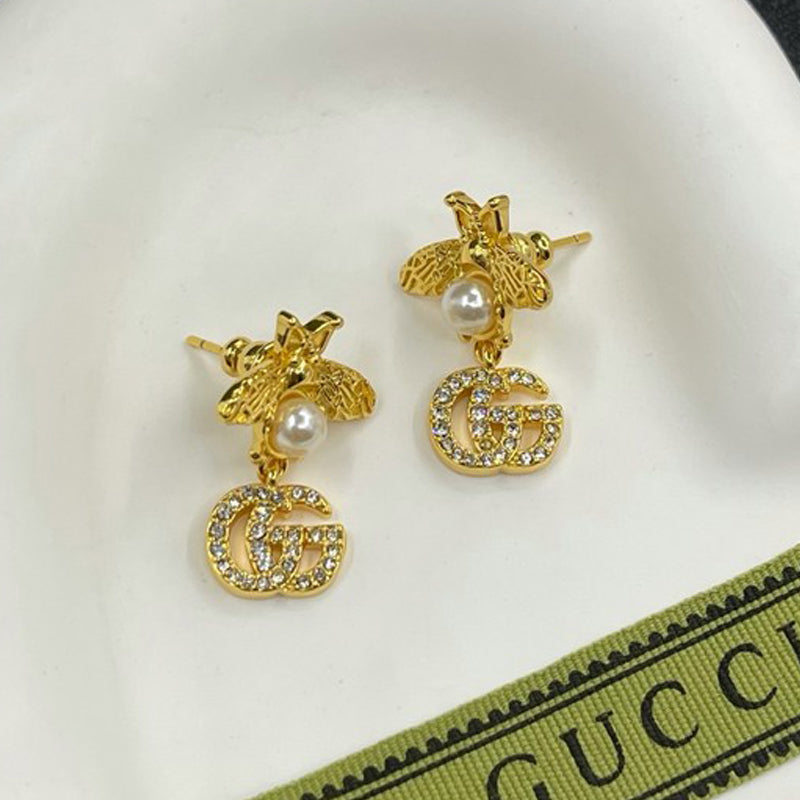 18K Gucci Flower Diamond Earrings