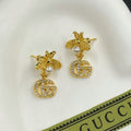 18K Gucci Flower Diamond Earrings