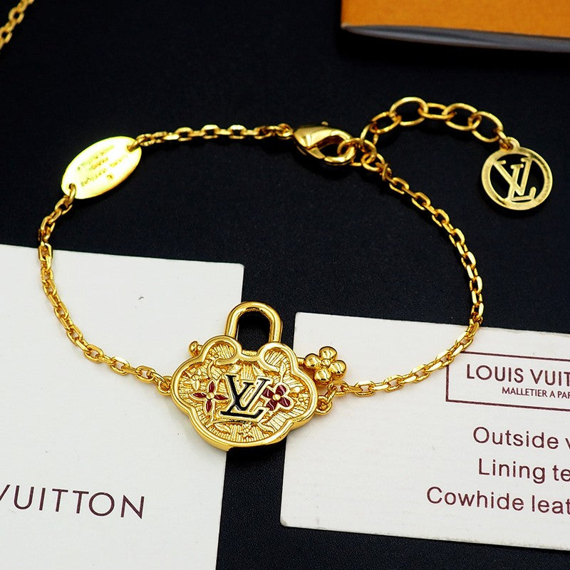 18K Louis Vuitton Vintage Lock Gold Bracelet
