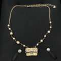 18K Chanel Bag Pearl Necklace
