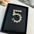 18K Chanel No.5 Pearl Gold Brooch