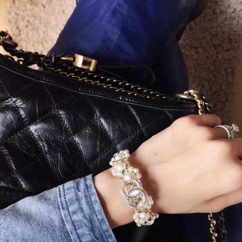 18K Chanel Pearl Braided Bracelet