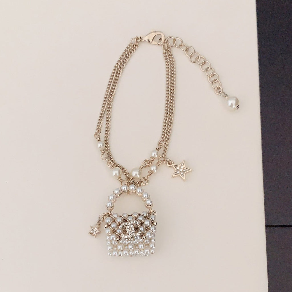 18K Chanel Bag Pendant Pearl Bracelet