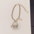 18K Chanel Bag Pendant Pearl Bracelet