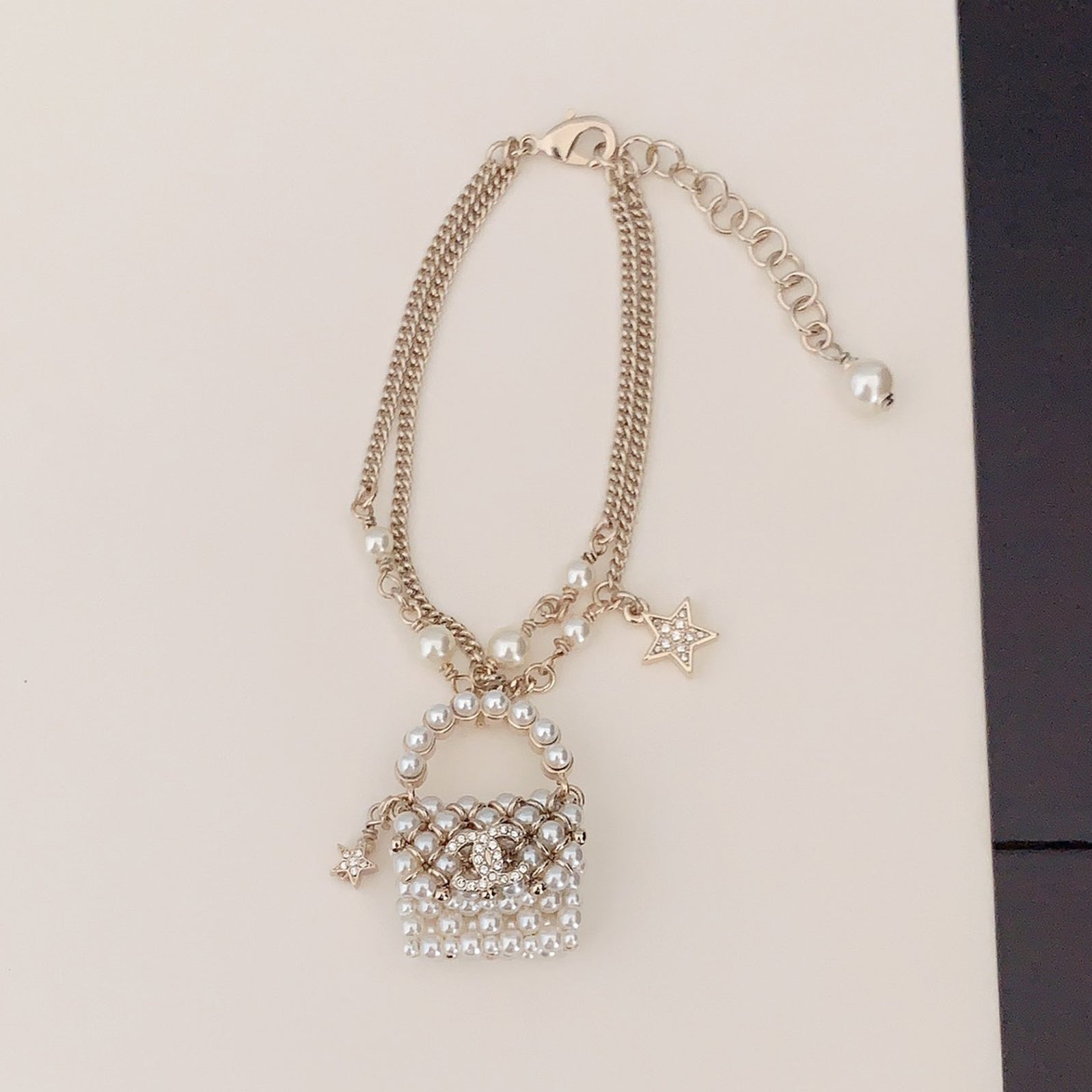 18K Chanel Bag Pendant Pearl Bracelet