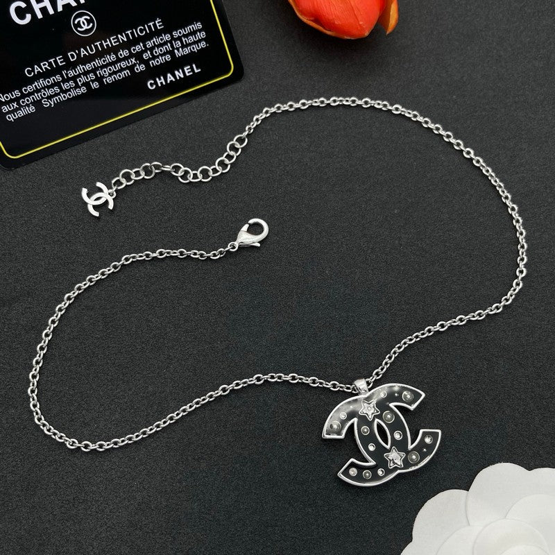 18K Chanel Black Star Gold Necklace