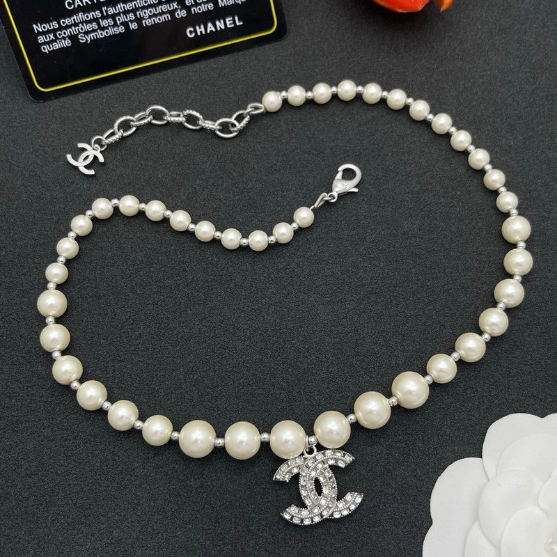 18K Chanel Pearl Diamond Logo Necklace