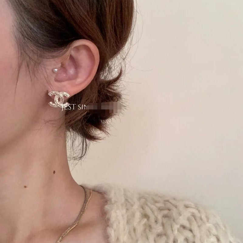 18K Chanel Relief Gold Earrings