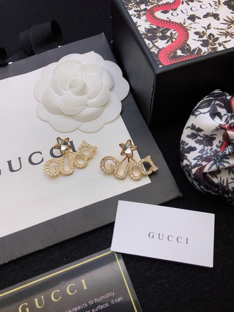 18K Gucci Script Star Earrings