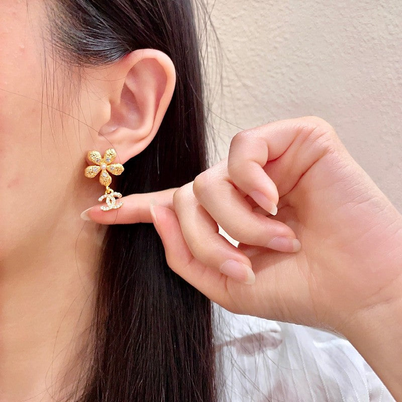 18K Chanel Diamond Flower Gold Earrings