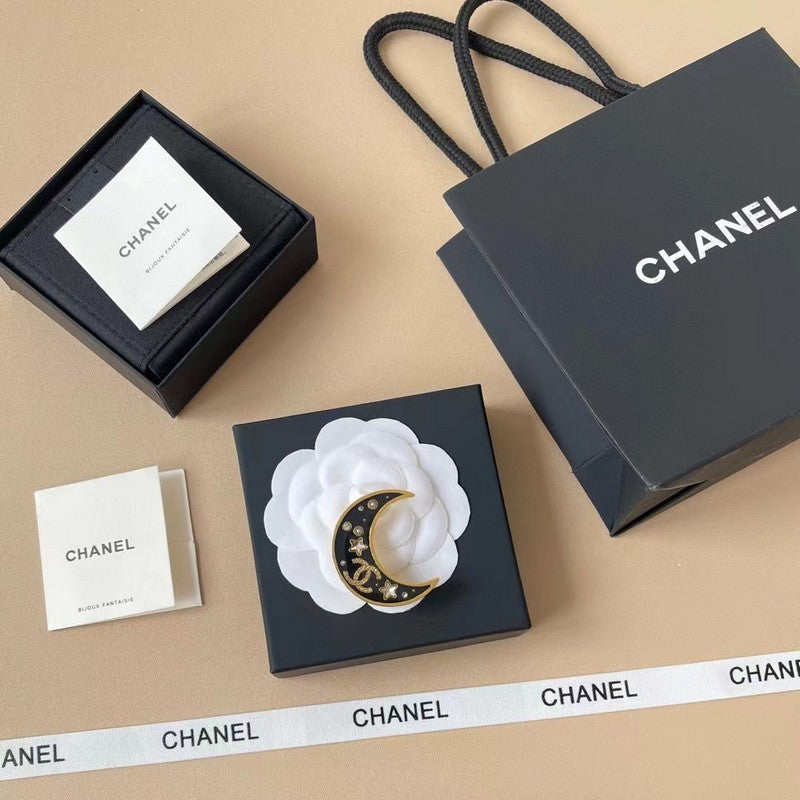 18K Chanel 25K Black Moon Brooch
