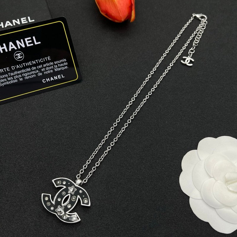 18K Chanel Black Star Gold Necklace