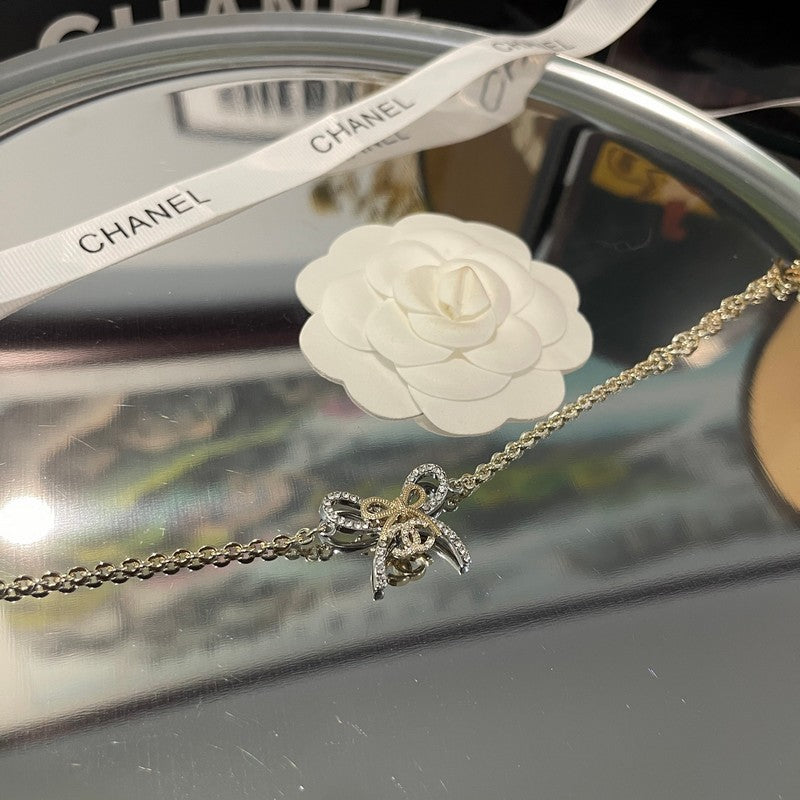 18K Chanel Bow Tie Chain Bracelet