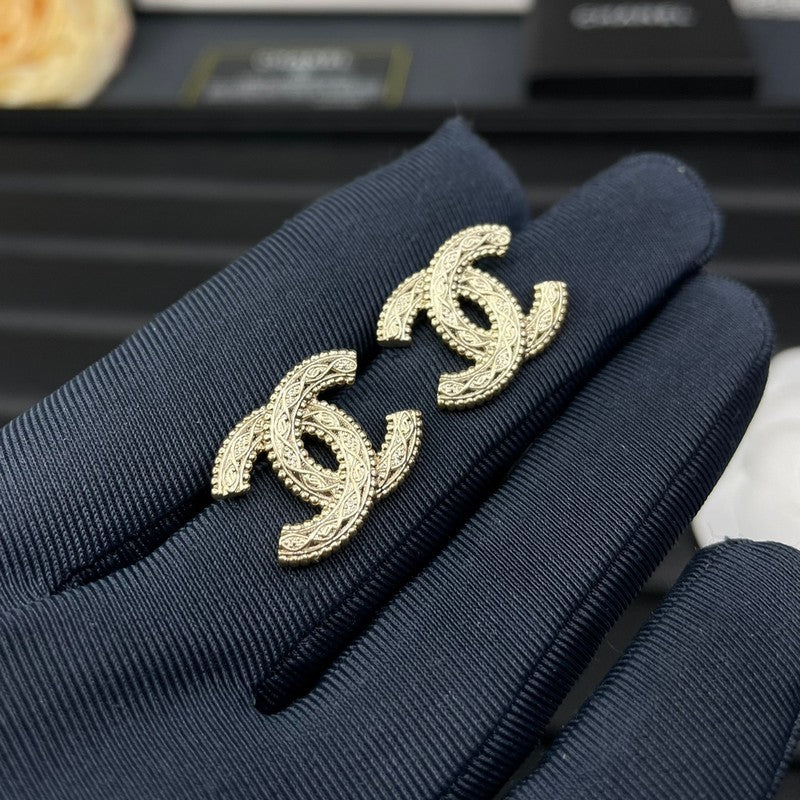 18K Chanel Relief Gold Earrings
