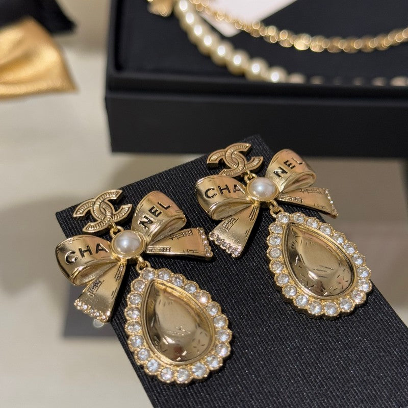 18K Chanel 25K Golden Bow Earrings