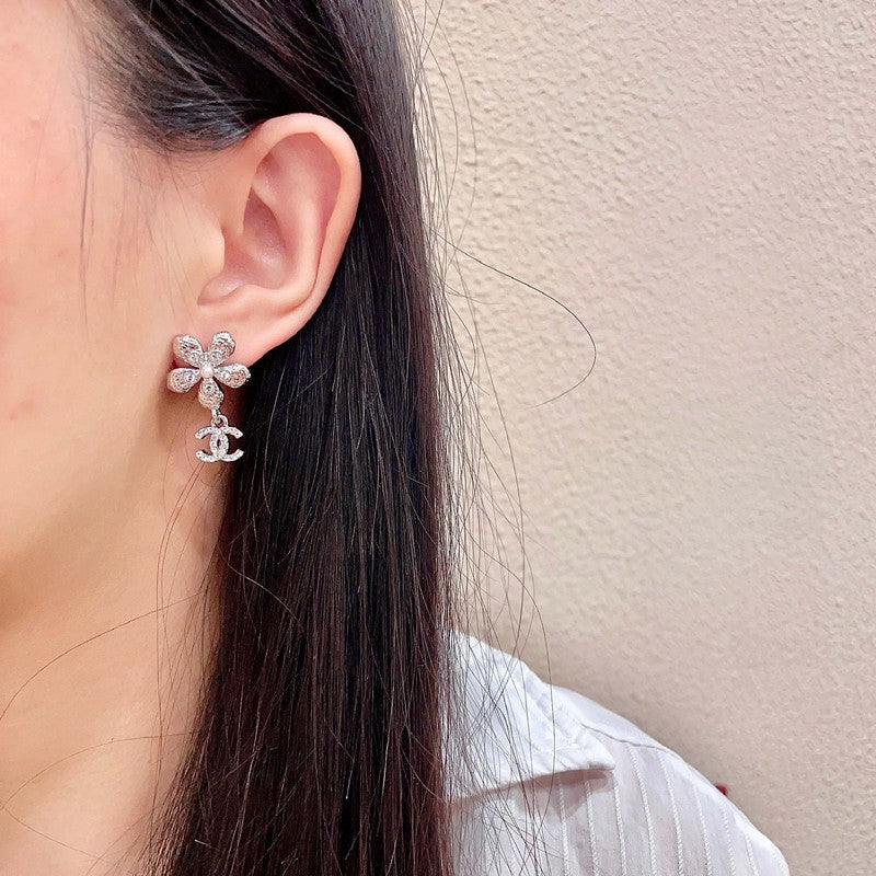 18K Chanel Diamond Flower Gold Earrings
