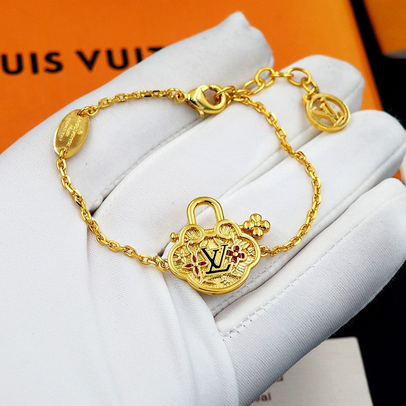 18K Louis Vuitton Vintage Lock Gold Bracelet
