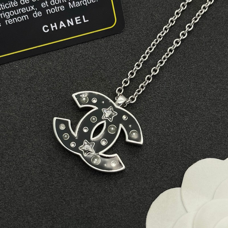 18K Chanel Black Star Gold Necklace