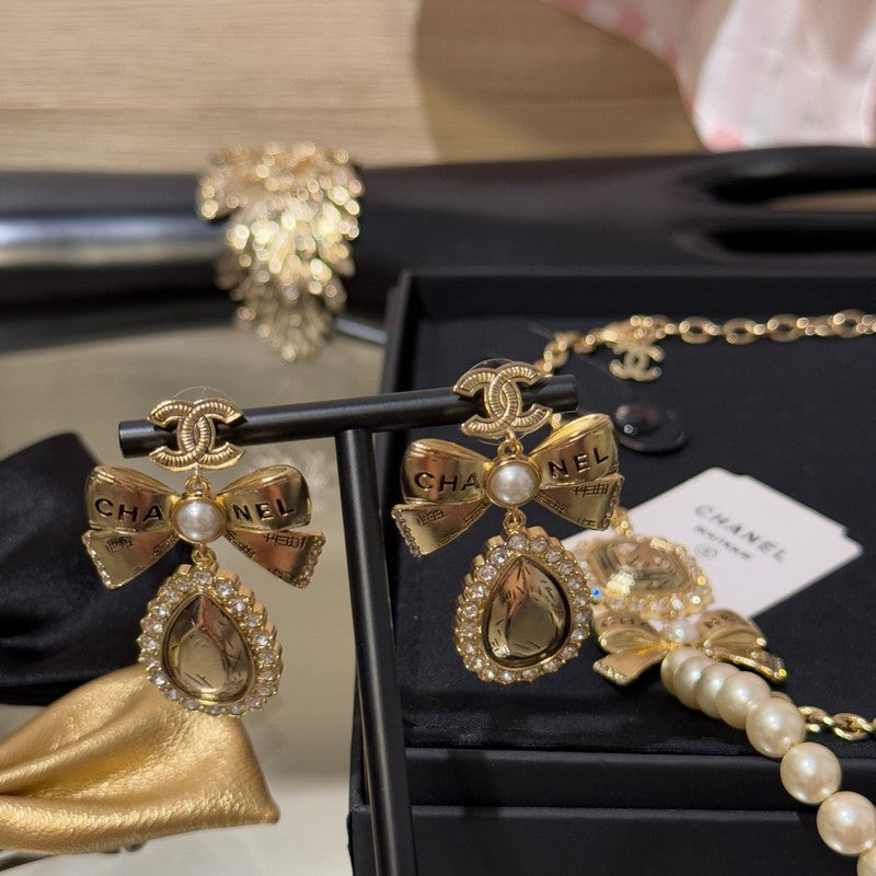 18K Chanel 25K Golden Bow Earrings