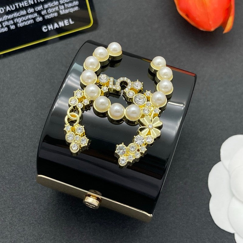 18K Chanel Pearl & Diamond Black Cuff Bracelet
