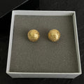18K Chanel Gold Round Earrings