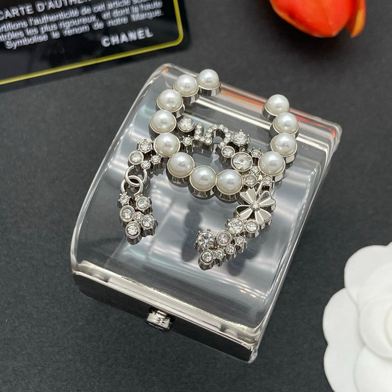 18K Chanel Pearl & Diamond Transparent Cuff Bracelet