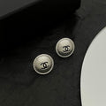 18K Chanel White Gold Round Earrings