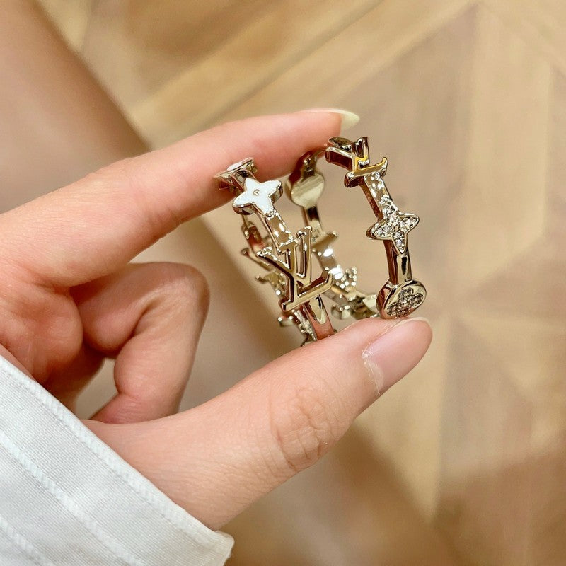 18K Louis Vuitton Blossom Black & White Earrings