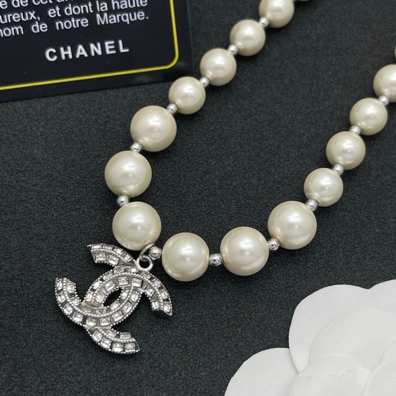 18K Chanel Pearl Diamond Logo Necklace