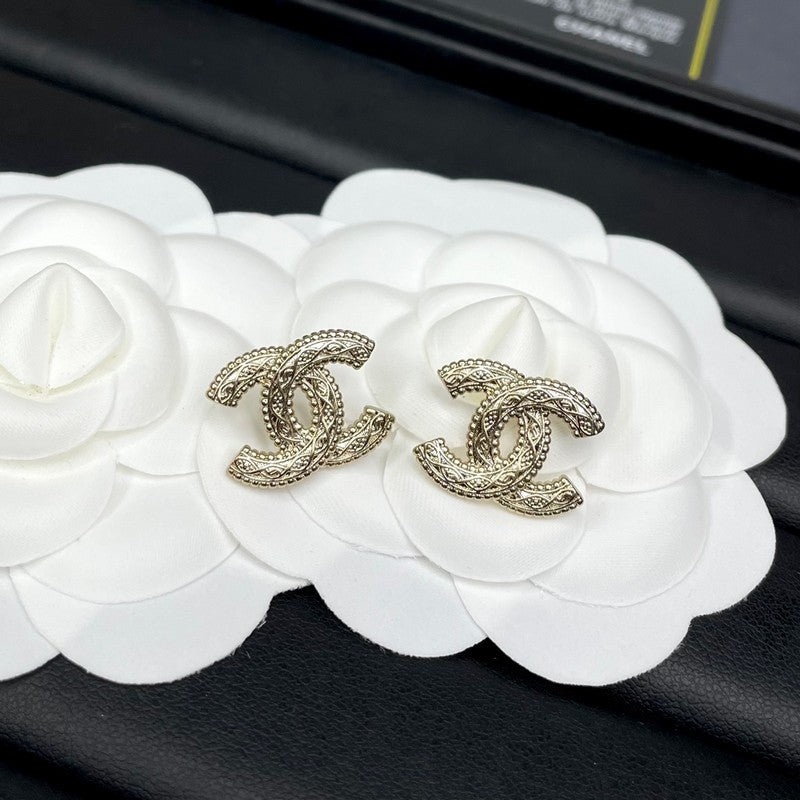 18K Chanel Relief Gold Earrings