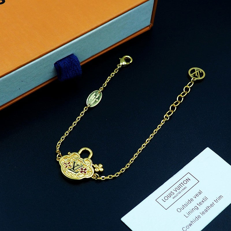 18K Louis Vuitton Vintage Lock Gold Bracelet