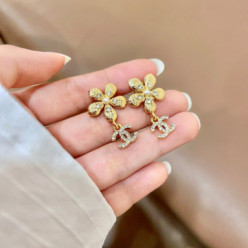 18K Chanel Diamond Flower Gold Earrings