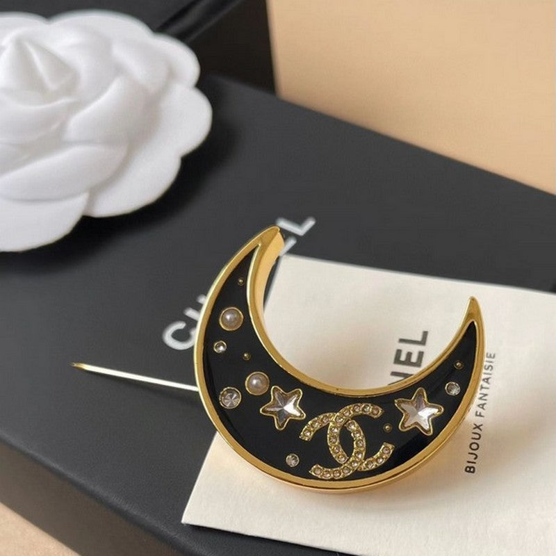 18K Chanel 25K Black Moon Brooch