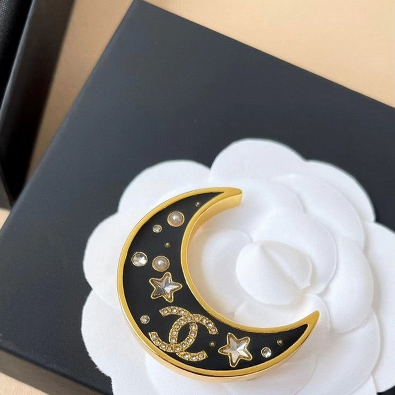 18K Chanel 25K Black Moon Brooch